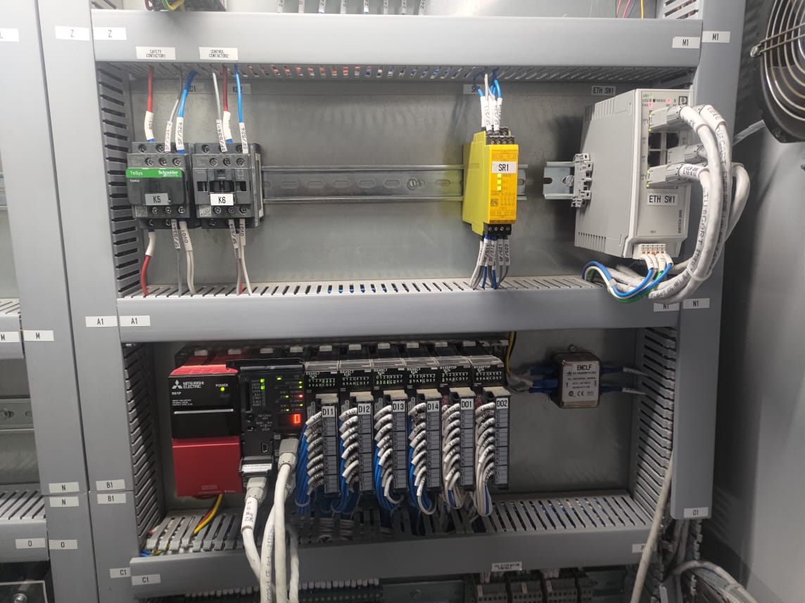 Mitsubishi PLC rack with Schneider contactors and safety relay